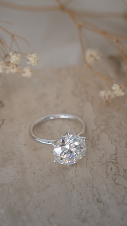 Round Solitaire Diamond Engagement Ring video — on hand