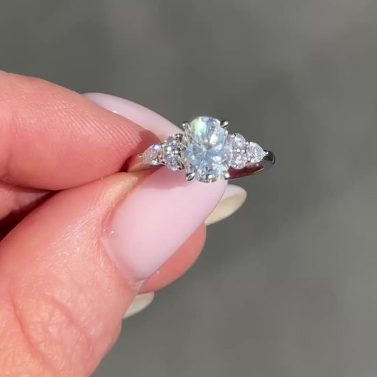 Oval Trio Accent Stones Moissanite Engagement Ring video — front view