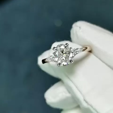 Oval Trio Accent Stones Moissanite Engagement Ring video — on hand