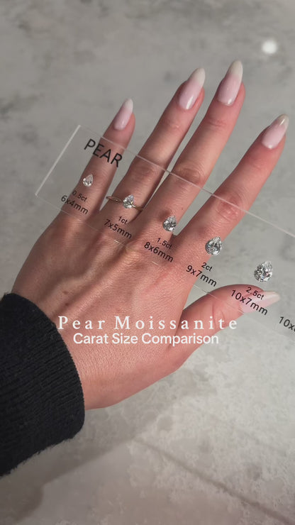 video showing pear moissanite solitaire rings, size comparison, hand model wearing each, visual size guide | Moissanite Engagement Rings